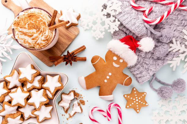 istock Gingerbread man, cookies and Christmas decor on pastel background. 1384304954
