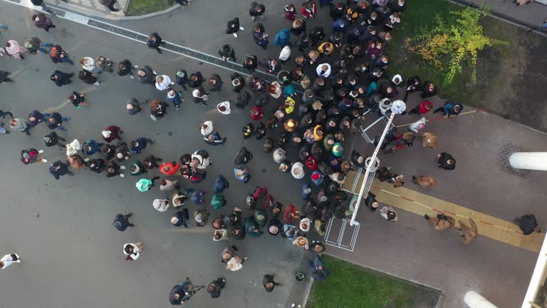 Crowd of Refugees Awaiting For Vaccination and Free Food