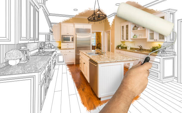 Before and After of Man Painting Roller to Reveal Newly Remodeled Kitchen Under Pencil Drawing Plans. stock photo