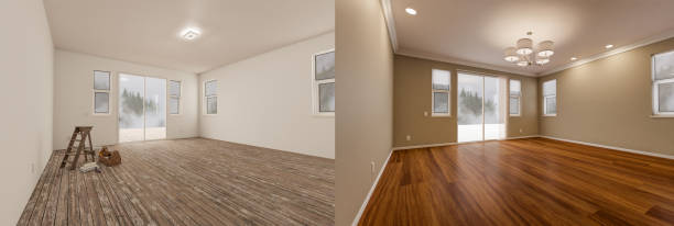 Before and After of Unfinished Raw and Newly Remodeled Room Of House with Finished Wood Floors, Moulding, Paint and Ceiling Lights. stock photo