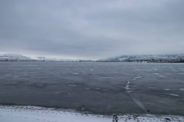 istock frozen lake on a cloudy winter day in the mountains 1384318885