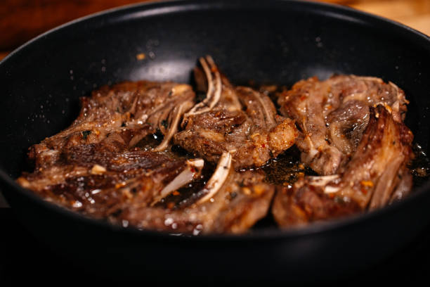 istock Lamb Cooking. Delicious Meat dish. 1384330009