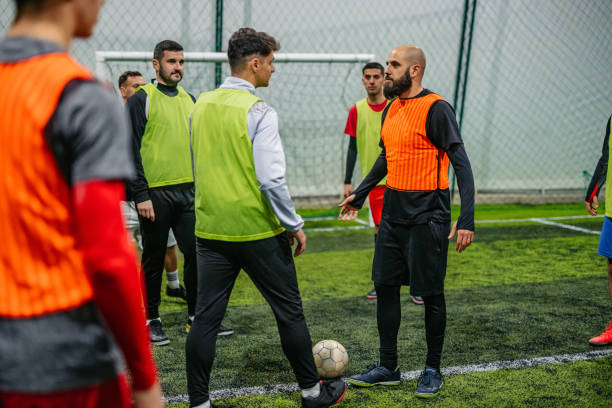 istock Soccer players having a conflict on field 1384332808