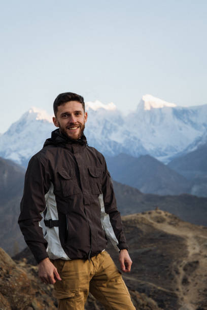 istock A young man enjoy the sunset in Himalayas mountain 1384332862