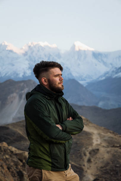 istock A young man enjoy the sunset in Himalayas mountain 1384332877