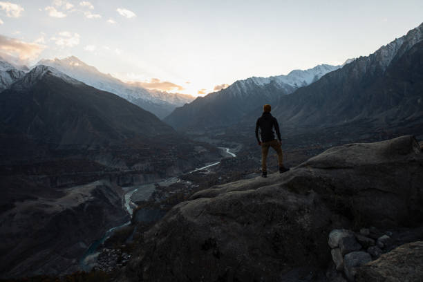 istock A young man enjoy the sunset in Himalayas mountain 1384332890
