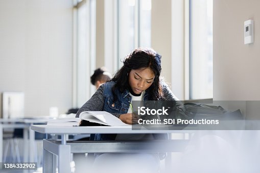 istock Focused young woman 1384332902