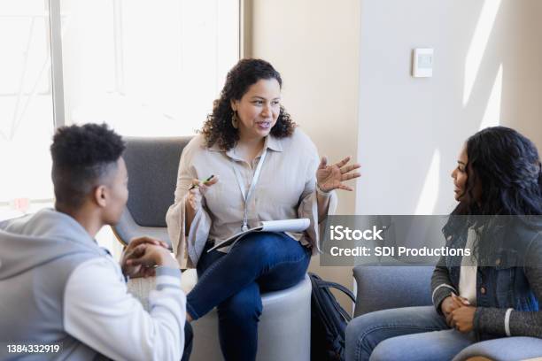 Professor Has Small Group Meeting Stock Photo - Download Image Now - Mental Health Professional, Mental Health, Psychotherapy
