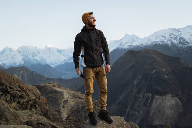 istock A young man enjoy the sunset in Himalayas mountain 1384332951