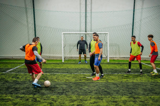 istock Soccer player taking a free kick 1384334429