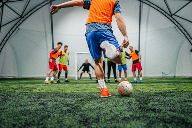 istock Soccer player taking a free kick 1384334560
