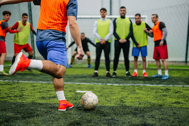 istock Soccer player taking a free kick 1384334745