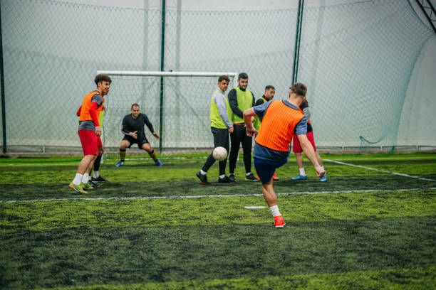 istock Soccer player taking a free kick 1384335759