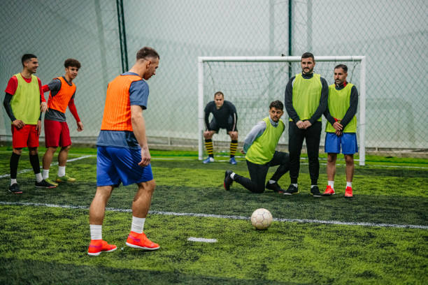 istock Soccer player taking a free kick 1384335963
