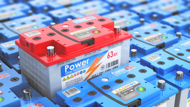 Battery choice. Car battery without brand surrounded by other batteries. 3d illustration stock photo