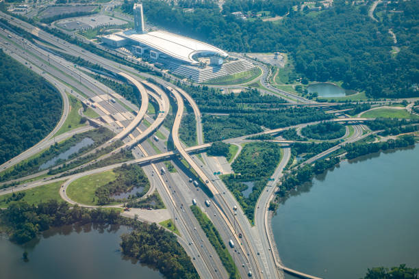 Aerial drone airplane view of cityscape near Oxon Hill in Washington DC with i495 highway capital beltway outer loop with traffic cars and buildings stock photo