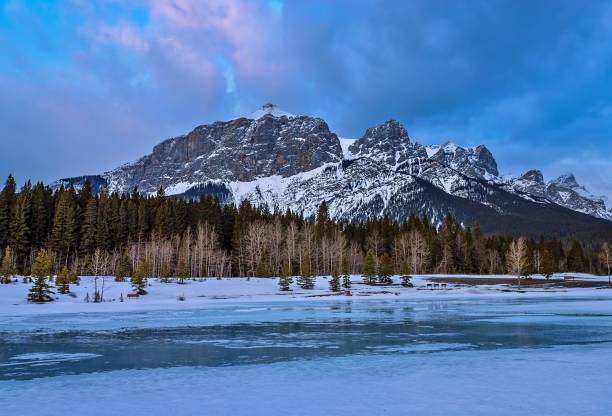 istock Morning Sky Over Wintry Mountains At Quarry Lake 1384337501