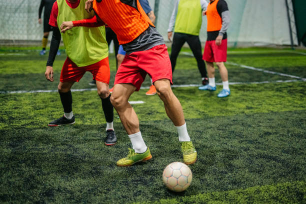 istock Soccer player guarding ball in game 1384339047