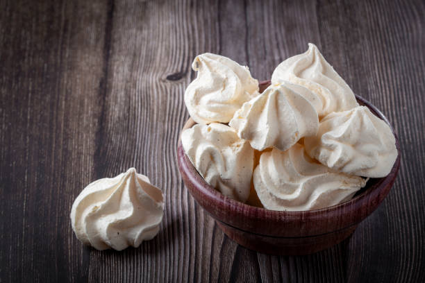 Delicious meringue cookies on the table. Delicious meringue cookies on the table. meringue stock pictures, royalty-free photos & images