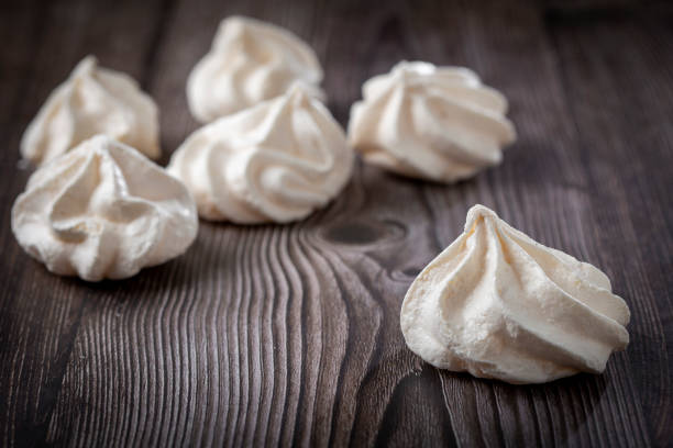 istock Delicious meringue cookies on the table. 1384347162