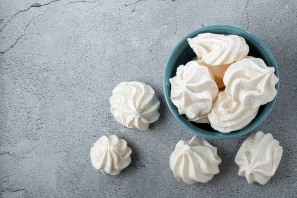 istock Delicious meringue cookies in the bowl. 1384348900