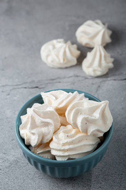 istock Delicious meringue cookies in the bowl. 1384348913