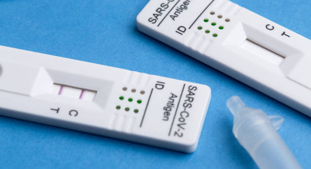 istock Positive test result by using rapid test device for COVID-19. 1384355826