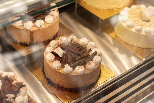 istock Showcase with cakes and sweets of many varieties 1384355840