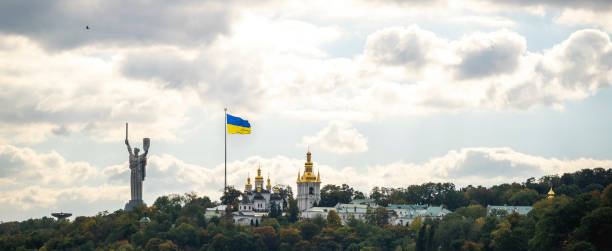 Kyiv Motherland Monument and Pechersk Lavra Kyiv Motherland Monument and Pechersk Lavra, 6.10.2021 dnieper river stock pictures, royalty-free photos & images