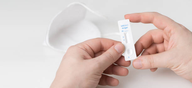 istock Corona virus antigen fast test. Lab card kit test for COVID-19. 1384356005