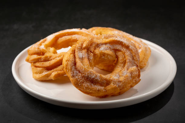 istock Sugared donuts on the table. Brazilian donuts. 1384356053