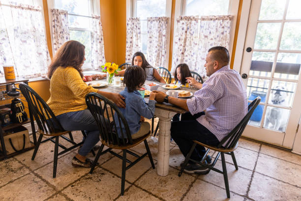 istock Mexican Family Having Breakfast at the table 1384356115