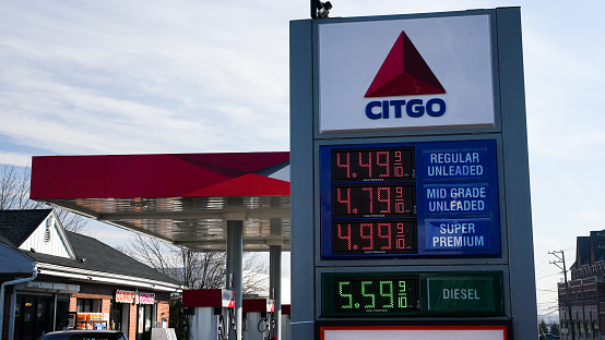 Norwalk, CT, USA - March 11, 2022: Citgo gas station price sign near Post road and I -95 view in nice sunny day with blue sky