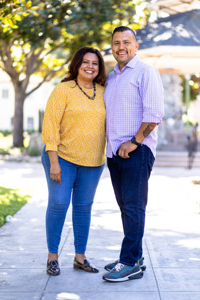 A married couple together in the park.