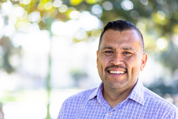 portrait of a handsome mexican man - men human face smiling mature adult imagens e fotografias de stock