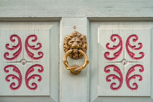 Brass door knocker in historic Charlestown, Boston, Massachusetts, USA.