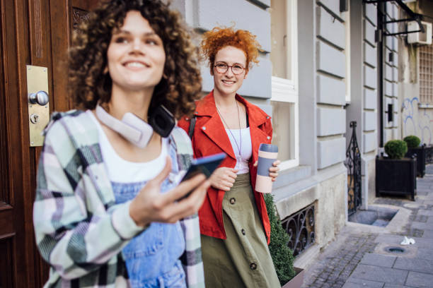 istock Two girls enjoying their coffee break after the university class 1384369436