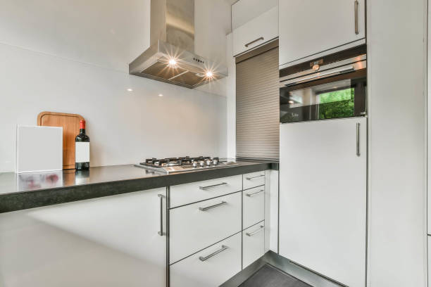 istock Kitchen with old fashioned white furniture 1384369559