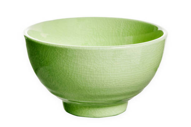 Ceramic bowl with cracked pattern, Light green bowl isolated on white background with clipping path, Side view