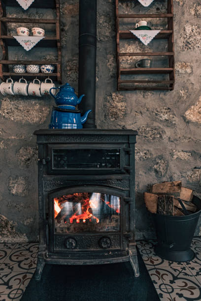 istock Authentic house fireplace in village house 1384421772