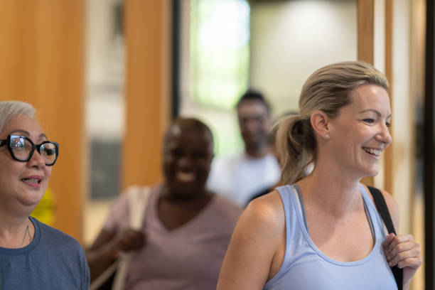 istock Adults Leaving a Yoga Class 1384422477