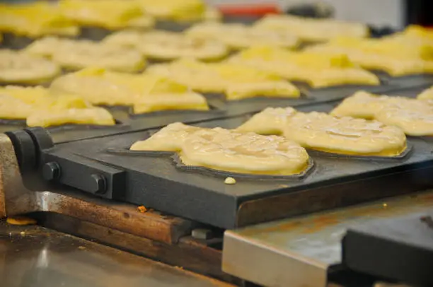 Famous Japanese Taiyaki red bean fish shape dessert snack cooking being made