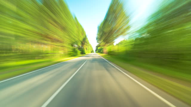 4K Point of View Hyperlapse Time-lapse of Car Driving Through Country Road.