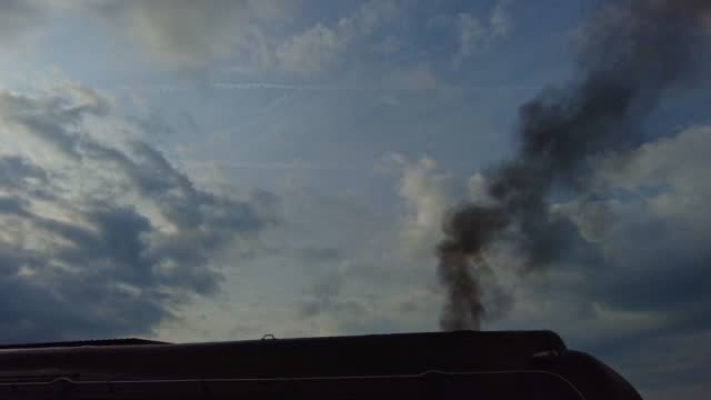 Close of Black Smoke Coming out of an Antique Steam Engine