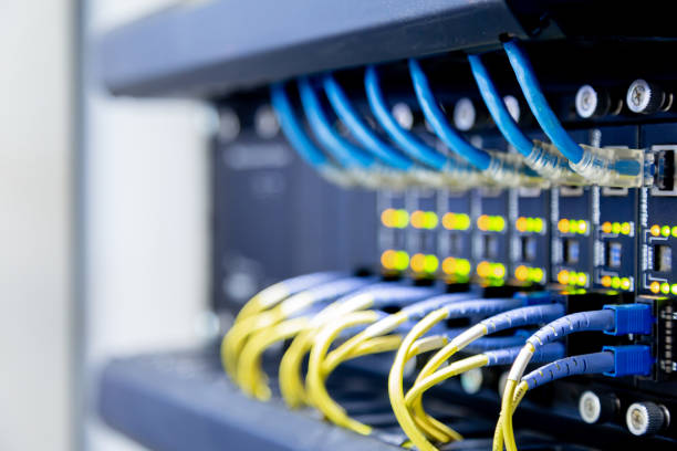 Network switch and ethernet cables,Data Center Concept. stock photo