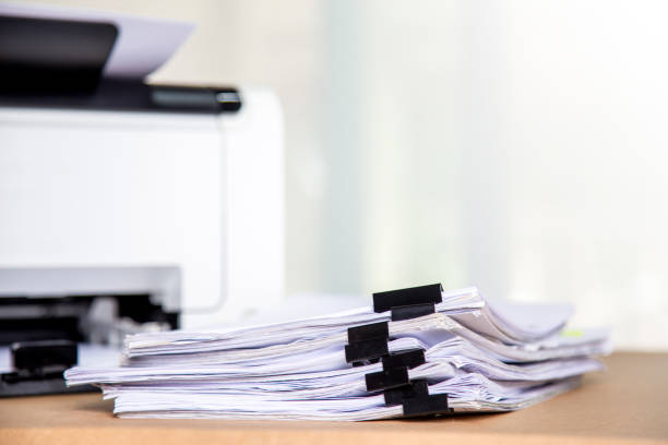 istock Printer, copier, scanner in office. Workplace ,photocopier machine for scanning document printing a sheet paper and xerox photocopy. 1384425235