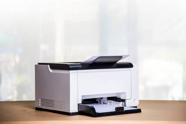 istock Printer, copier, scanner in office. Workplace ,photocopier machine for scanning document printing a sheet paper and xerox photocopy. 1384425249