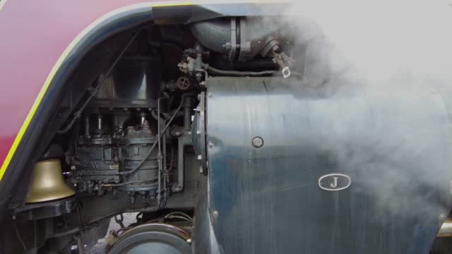 Close Up Look at the Compressor and Valves of an Antique Steam Locomotive as it Gets Ready for a Days Work