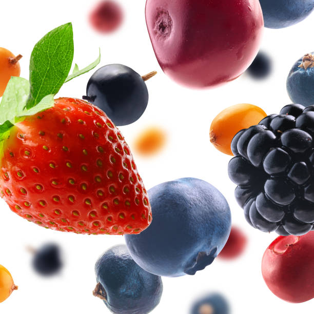 istock Many different berries in the form of a frame on a white background 1384427703