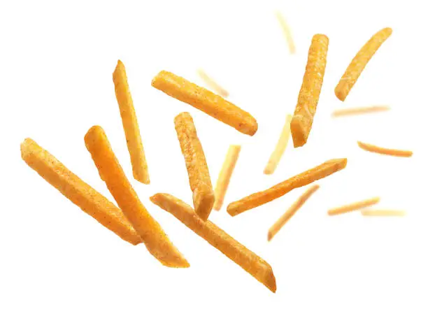 French fries levitate on a white background.